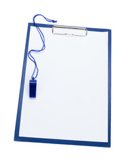A blank clipboard and a coaches whistle with copy space