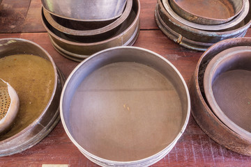 Phuket, Thailand - Mar 26, 2016 : Old metal sieves for mining work demonstrated at Phuket Mining Museum, Thailand
