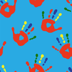 Seamless texture with handprints on a blue background