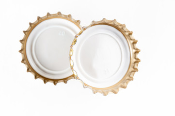 Two beer bottle corks on white background