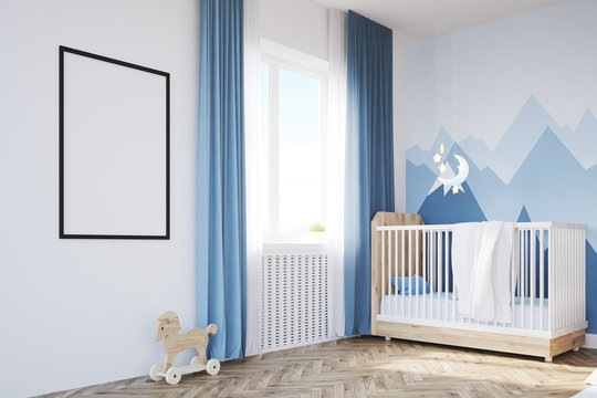 Baby's room with a crib and a poster