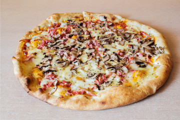 Pizza on wooden table