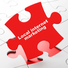 Marketing concept: Local Internet Marketing on puzzle background