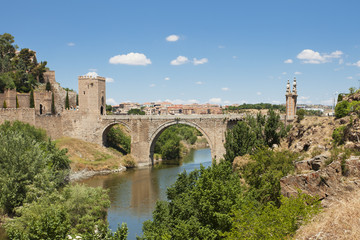 Fototapeta na wymiar Medieval bridge over the River Tajo in Toledo, Spain