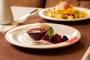 restaurant luxury berry dessert, cheesecake with jam