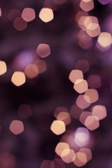 Colorful lights on red background. holiday bokeh. Abstract Christmas