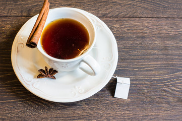 Spiced tea on rustic background