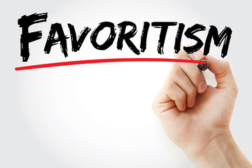 Hand writing Favoritism with marker, concept background