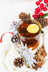 Spiced tea on rustic background
