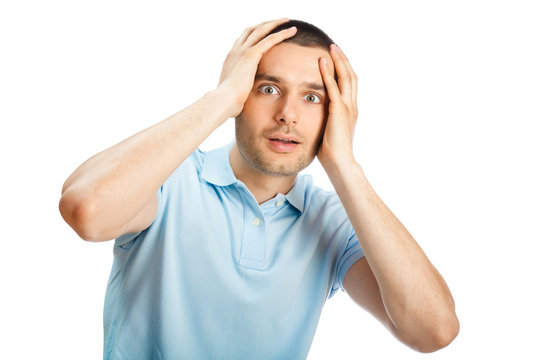 Puzzled man, isolated on white