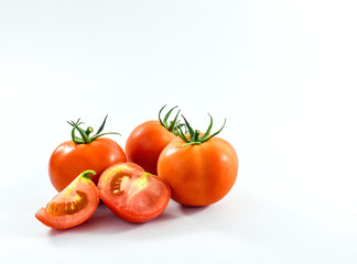 Fresh tomatoes on white background. Organic vegetable for healthy eating.