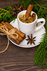 Cup of coffee on dark wooden table