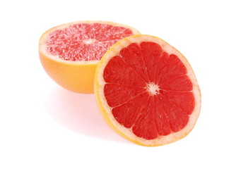 Fototapeta na wymiar Half and slice of grapefruit isolated on white