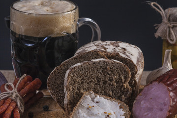 Pickles. Salted Cucumbers still-life with dark bread