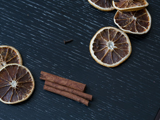 Slice of orange on black background