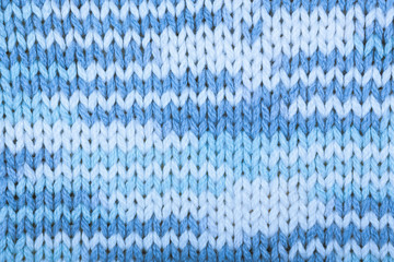 Knitted fabric textured background.