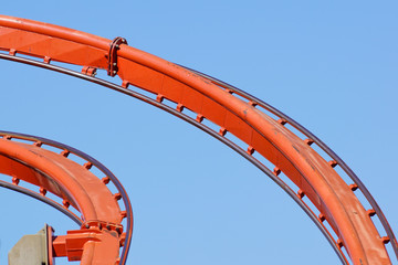 Rollercoaster against blue sky in the evening