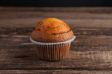 Cupcake on Wooden Background. Horizontal.