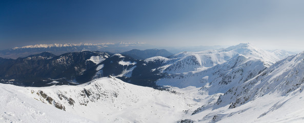 Fototapeta na wymiar Panorama of snowy mountains. Low Tatras, Slovakia