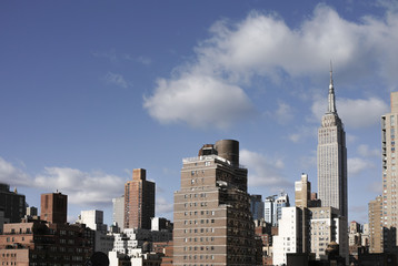 Manhattan midtown cityscape on a sunny day, harsh midday light,