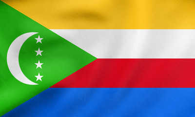 Flag of Comoros waving, real fabric texture