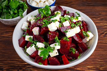 Healthy beetroot, feta cheese salad with parsley