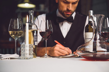 Alcohol critic writing his recommendation