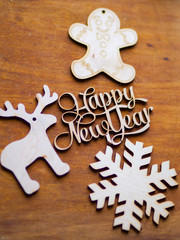 Wooden figures lie on a brown table