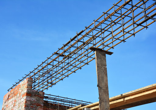 Lintel Construction. Rebar steel bars on new home construction corner, reinforcement concrete bars with wire rod as a lintel for window.