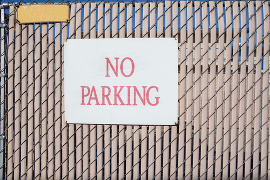 no parking sign on modern wall