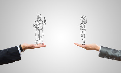 Caricatures of businessman and businesswoman