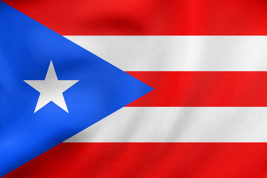 Flag of Puerto Rico waving, real fabric texture