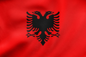 Flag of Albania waving, real fabric texture