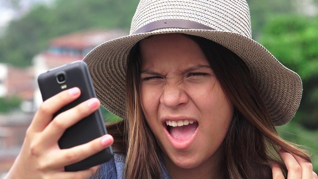 Adorable Teen Girl Making Selfies And Funny Faces