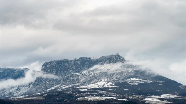 Snowy mountains, time lapse / Snowy clouds over the mountains, time lapse