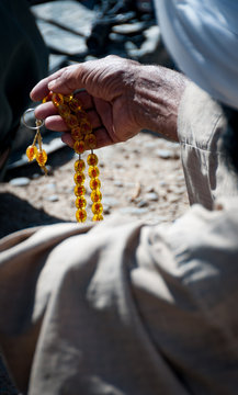 Prayer beads held by Afghan man, Helmand, Afghanistan