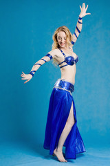 Beautiful belly dancer in motion