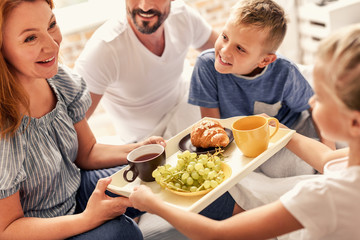 Family having breakfast at home