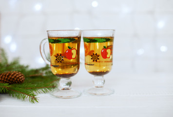 wooden background with green balls and gifts. 