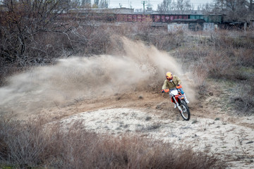 driver enters a turn on a sports motorcycle