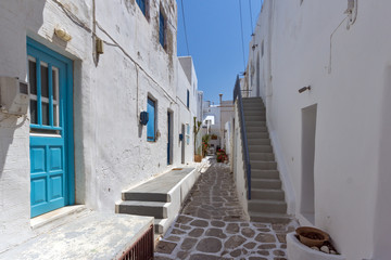 Fototapeta na wymiar Steet and Old stone house in Naoussa town, Paros island, Cyclades, Greece