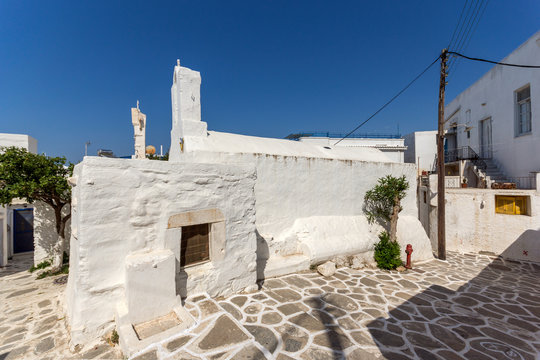 White chuch with blue roof in town of Parakia, Paros island, Cyclades, Greece