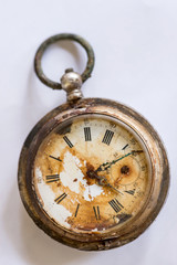 Old silver broken pocket watch.