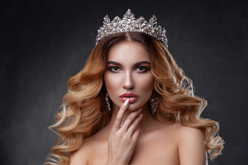 Beauty woman with beautiful make-up color, crown on his head  .