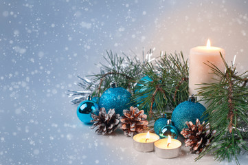 Christmas decoration with ball candle pine cones pine branch