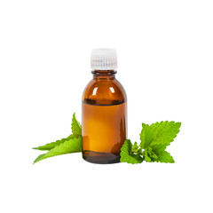 Bottle of Mint Oil and Fresh Mint Isolated on white. Selective focus.