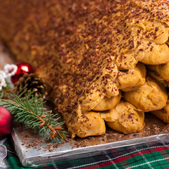 Russian Christmas Monastery Log House Cake (Monastyrskaya Izba). Selective focus.