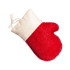 Obraz na płótnie Canvas Christmas Red and White Felt Mitten Isolated on a white background. Selective focus.