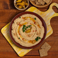 Healthy Homemade Hummus Dip with Olive Oil. Selective focus.