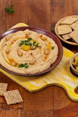 Healthy Homemade Hummus Dip with Olive Oil. Selective focus.